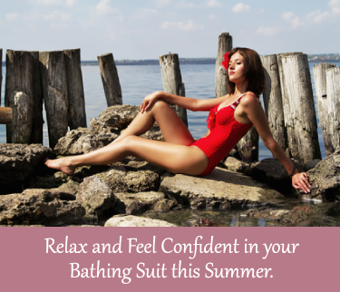 Woman in red swimsuit by the water.